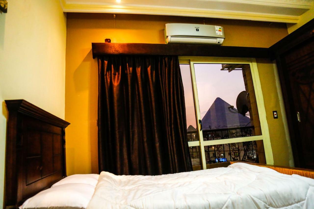 Happy Days Pyramids Inn Il Il Cairo Esterno foto